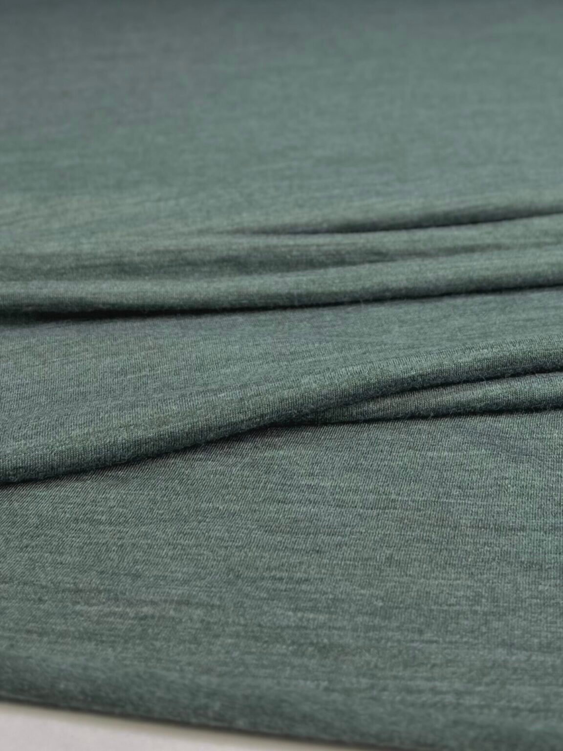 Merino vilnos elastingas trikotažas (premium kokybė) pilkšvai žalsvos spalvos melanžas 005