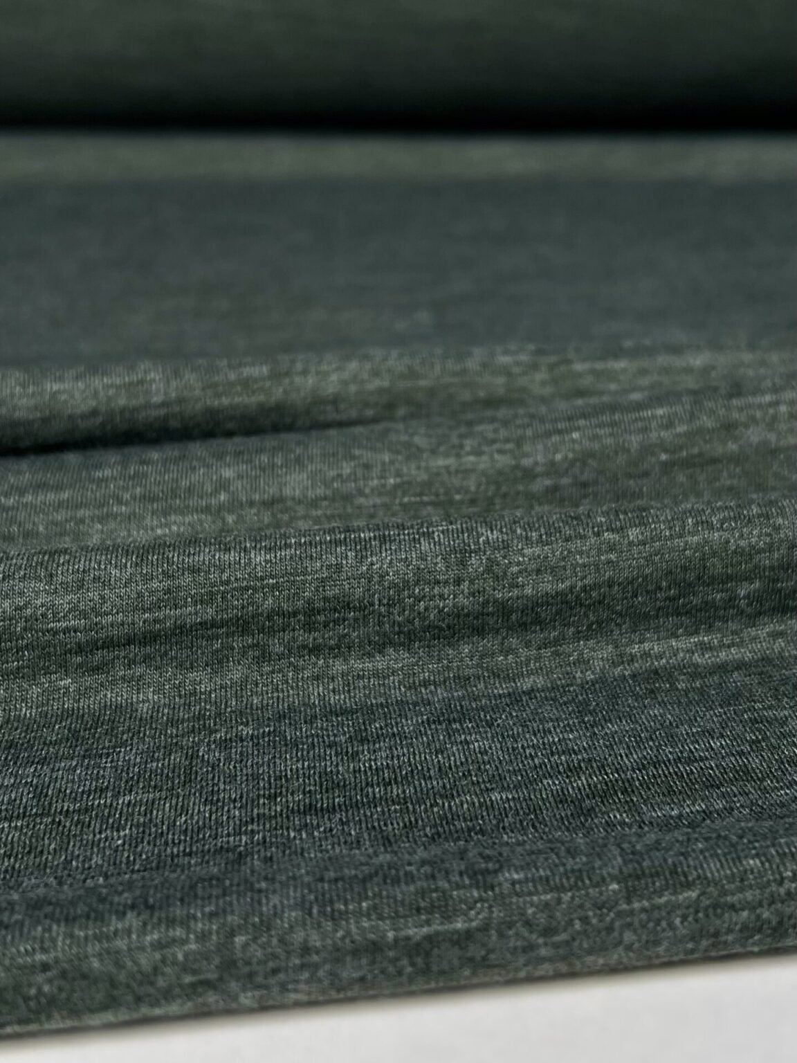 Merino vilnos ir poliesterio elastingas trikotažas (premium kokybė) žalios spalvos melanžas 068